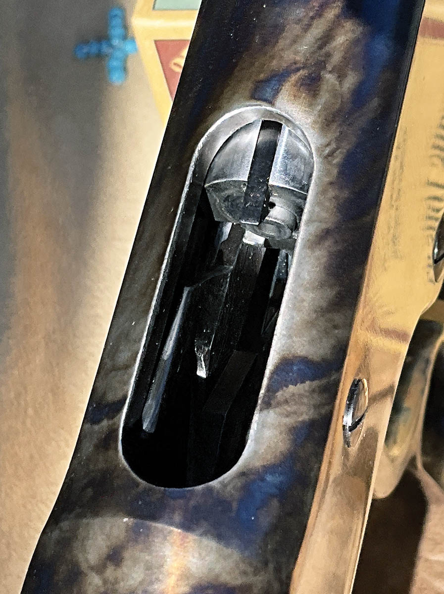 The firing pin bushing also acts as the ejector.